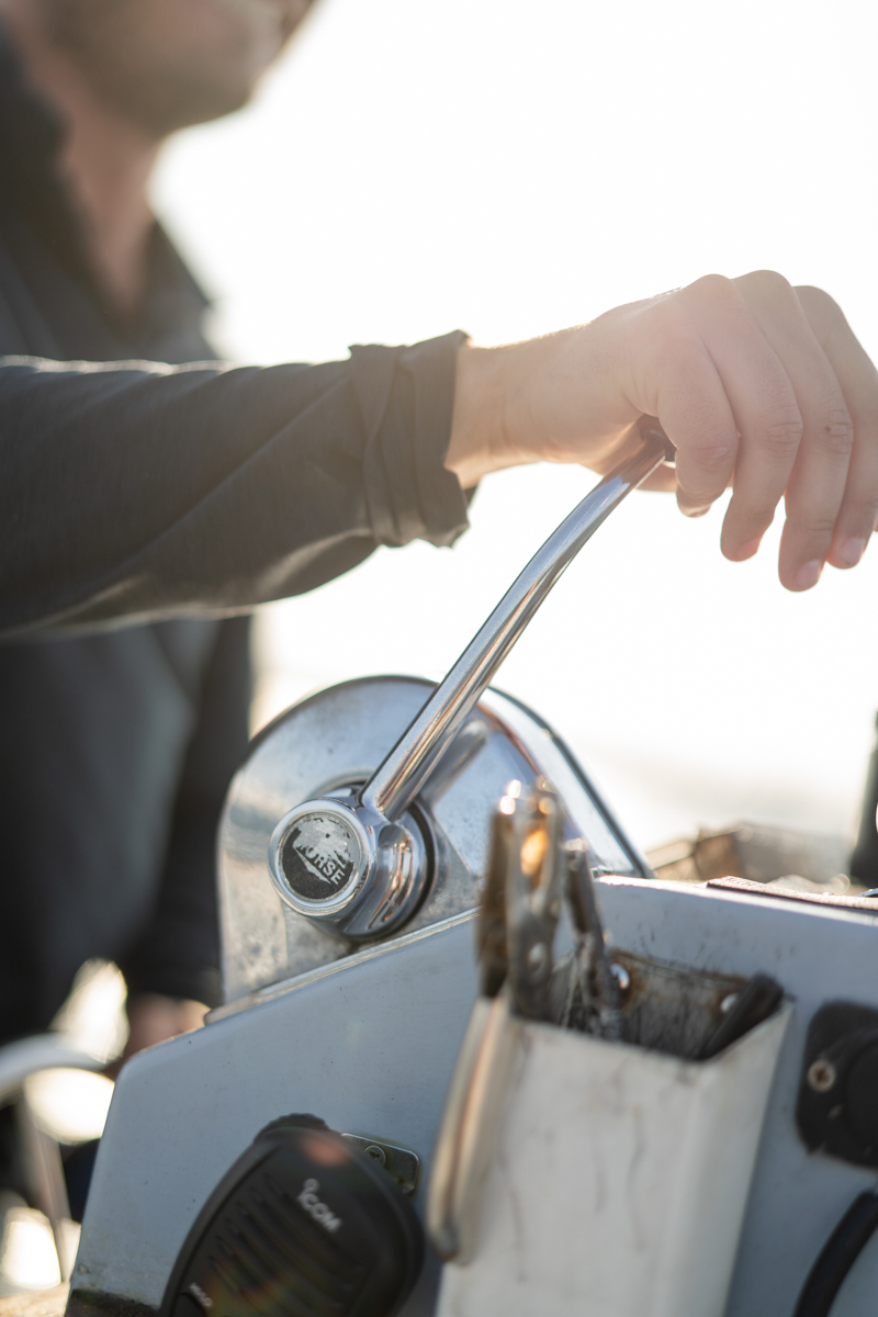 bride and groom on boat on Nantucket