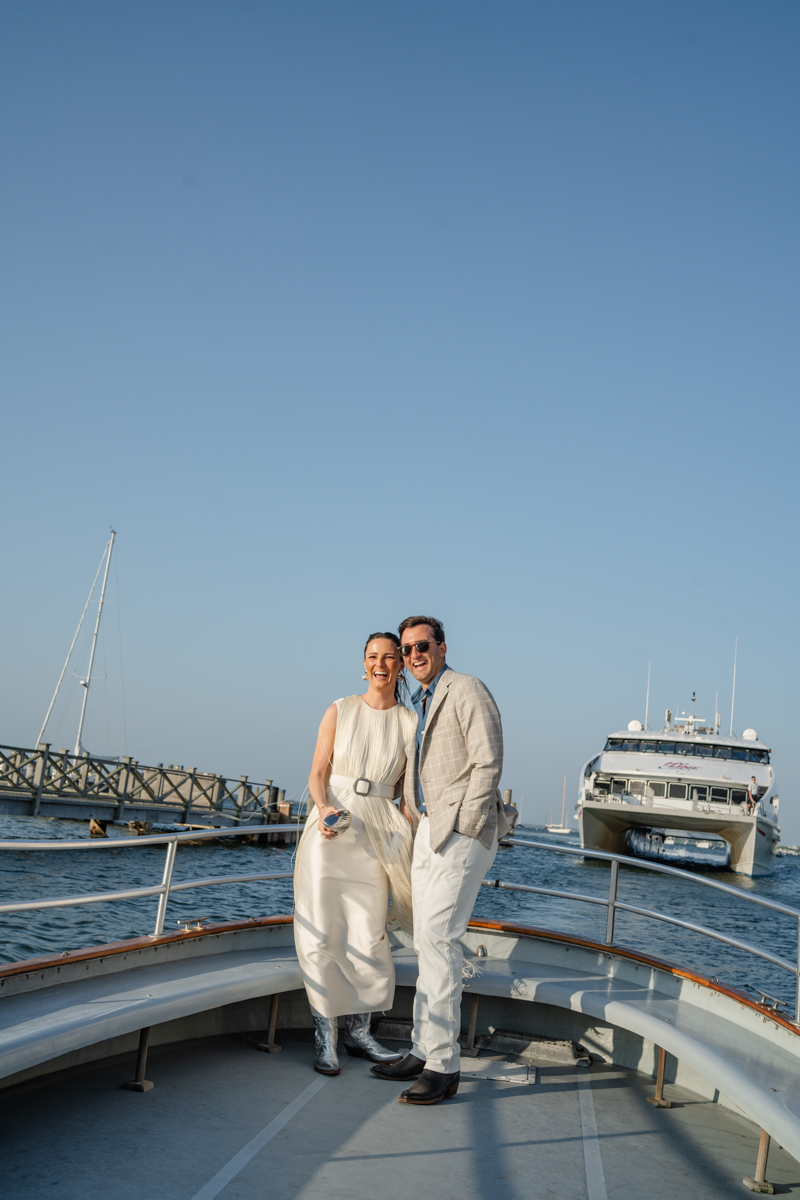 bride and groom on boat on Nantucket