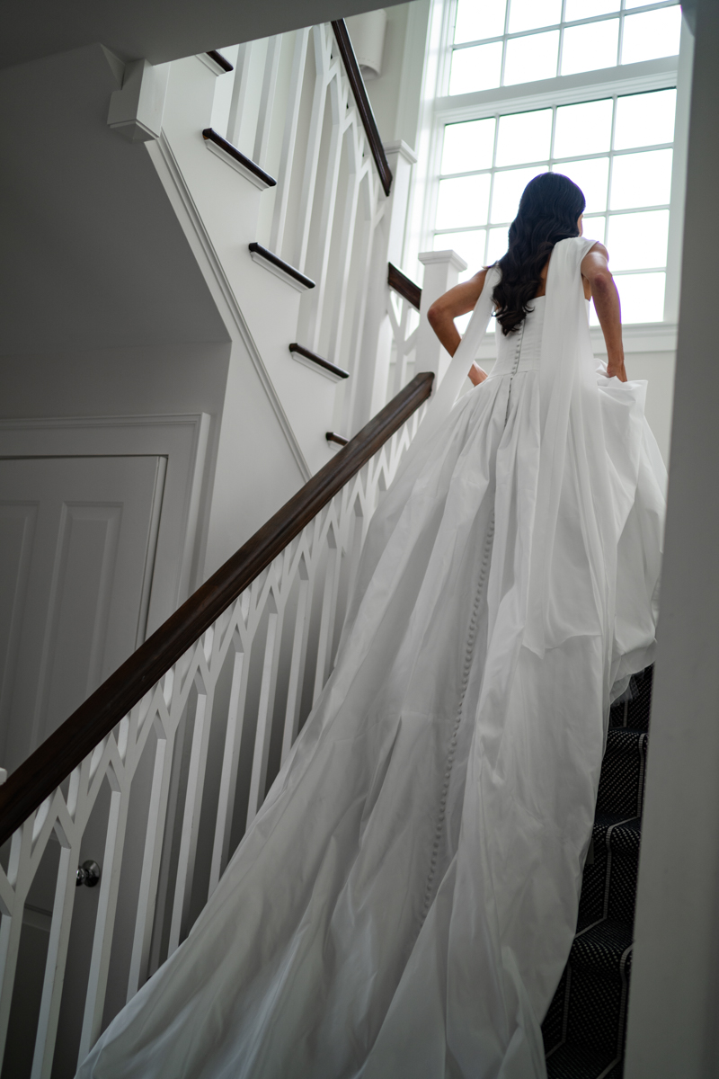 bride going up stairs 