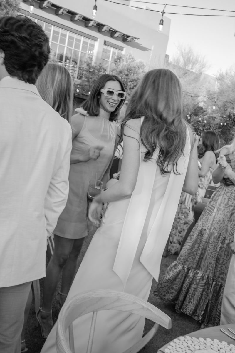 bride chatting with guests