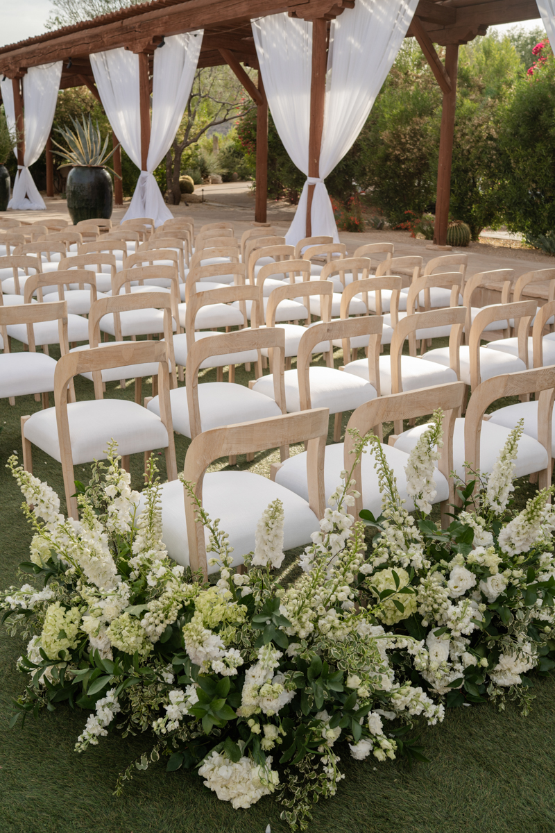 white and green ceremony with draping at four seasons wedding