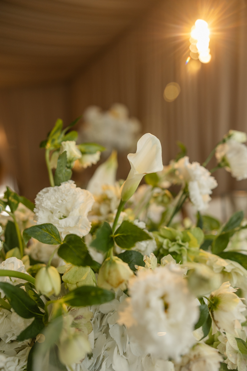 orchids and calla lily at four seasons wedding