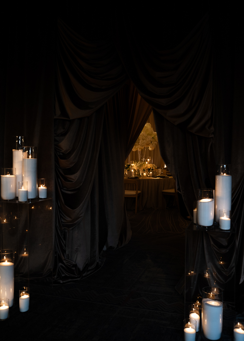 draped ballroom with candles