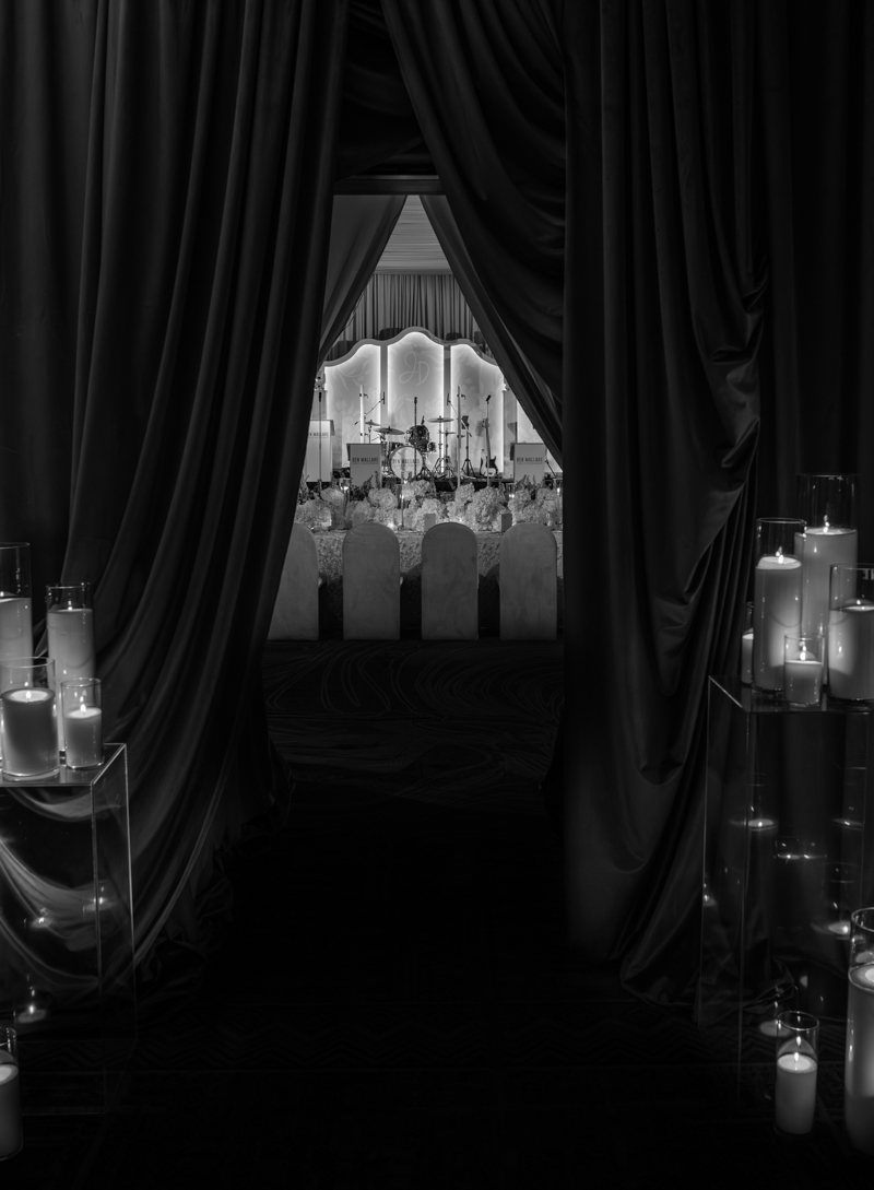 draped ballroom with candles and hydrangea centerpieces