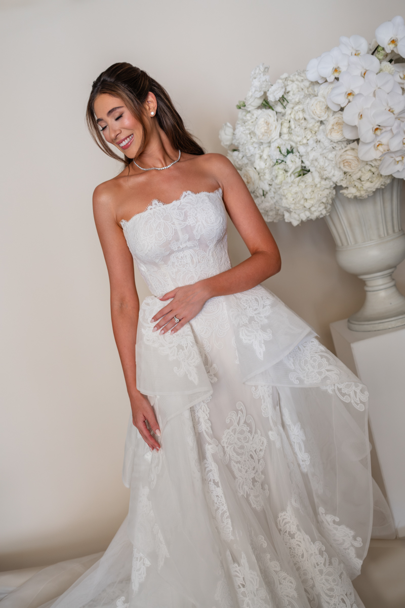 bride and groom editorial photos with floral piece