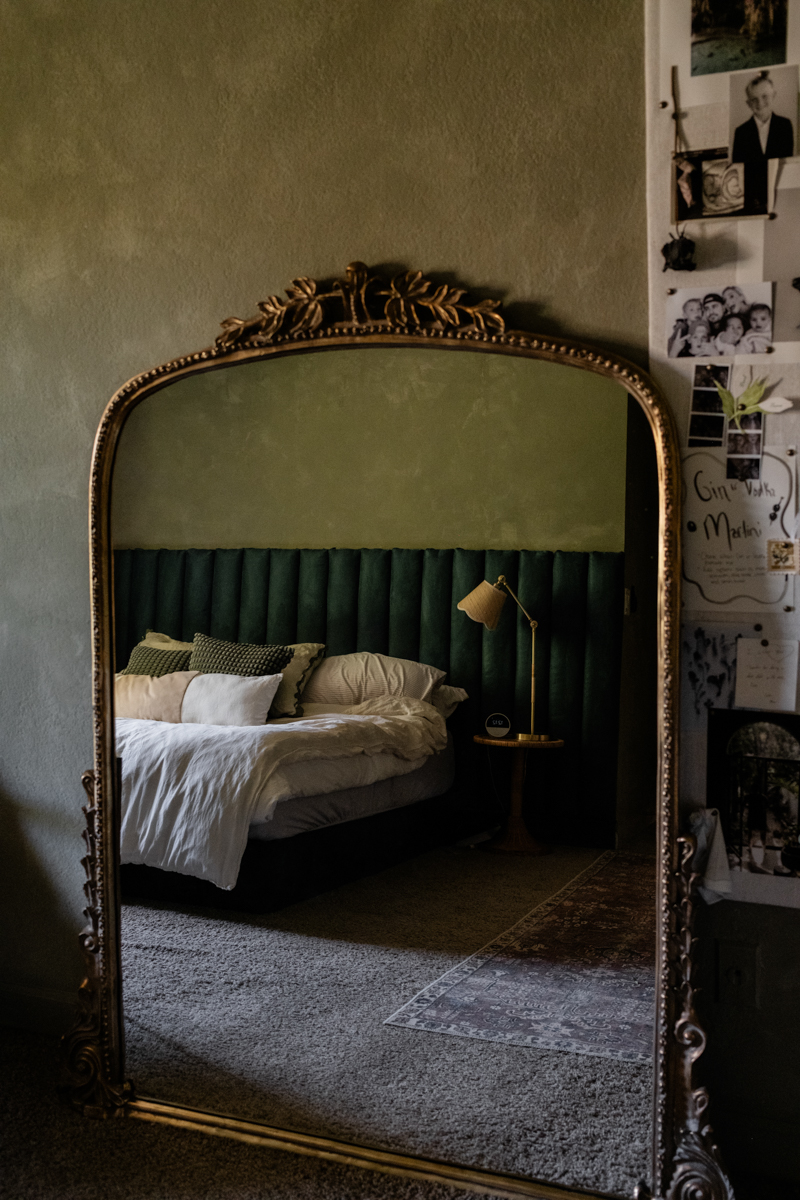 primary bedroom with green lime wash