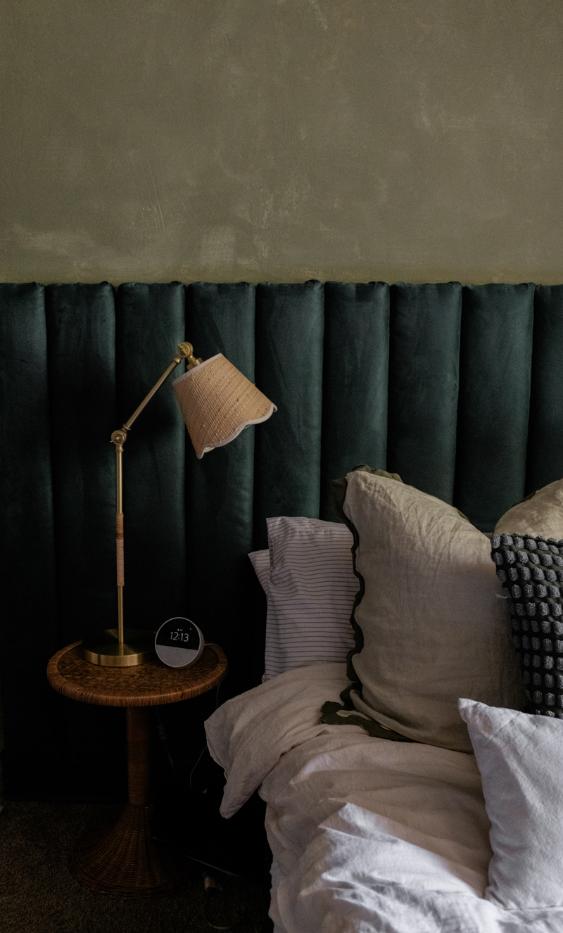 primary bedroom with green lime wash