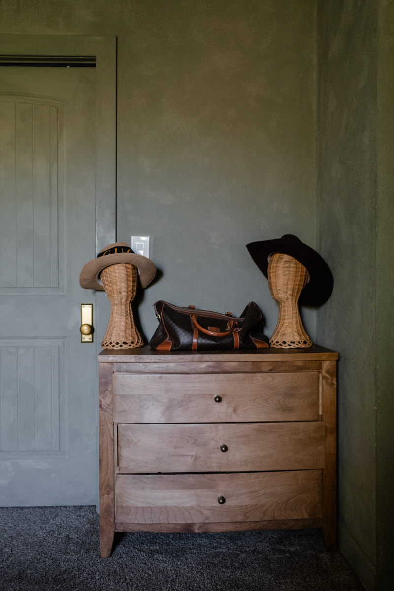 primary bedroom with green lime wash